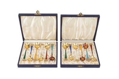 Lot 883 - Two sets of six Danish silver-gilt and enamel...