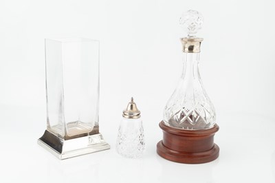 Lot 885 - A silver mounted cut glass decanter and...