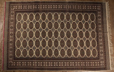 Lot 36 - Afghan sofa carpet of cream/ivory ground with...