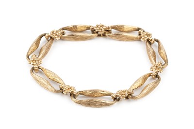 Lot 121 - A 9ct gold bracelet, formed of shaped and...