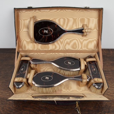 Lot 424 - Cased silver and tortoiseshell vanity set in...