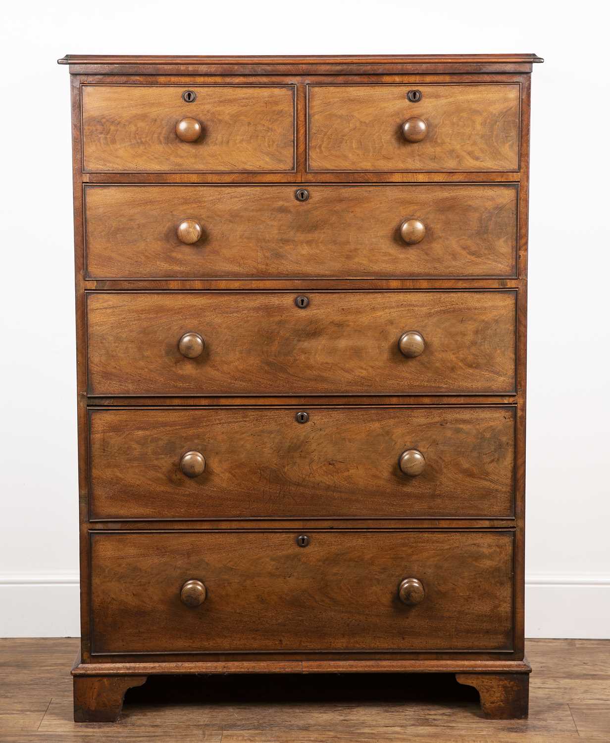Lot 13 - Stained hardwood chest of two over four...