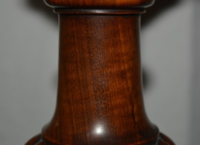 Lot 72 - Burr walnut tray top tripod table on a carved...