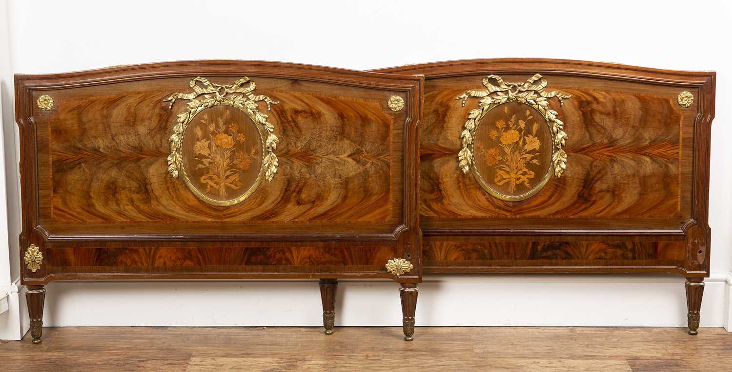 Lot 68 - Pair of inlaid bedends French, with ormolu...