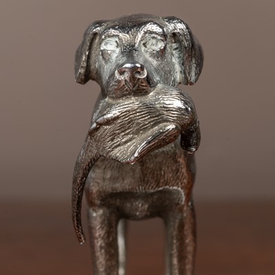 Lot 111 - A car mascot modelled as a labrador with a pheasant in its mouth