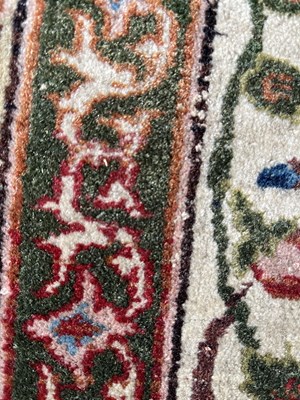 Lot 21 - A 20th century hand-woven Isfahan style Persian carpet