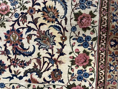 Lot 21 - A 20th century hand-woven Isfahan style Persian carpet