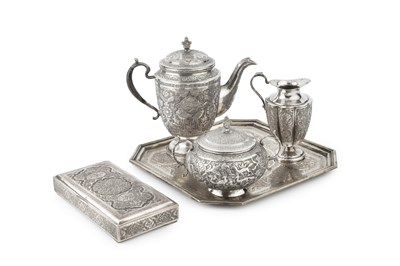 Lot 832 - An Indo-Persian silver three piece tea service...