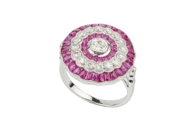 Lot 101 - A ruby and diamond cocktail ring, of target...