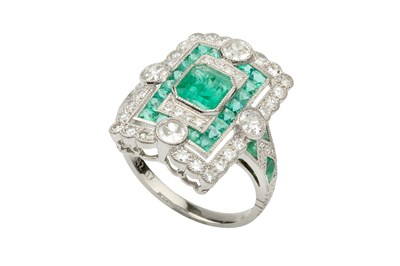 Lot 301 - An emerald and diamond panel ring, centred...