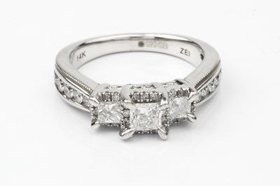 Lot 152 - A diamond 'trilogy' ring, the three principal...