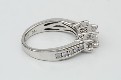 Lot 152 - A diamond 'trilogy' ring, the three principal...