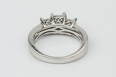 Lot 152 - A diamond 'trilogy' ring, the three principal...