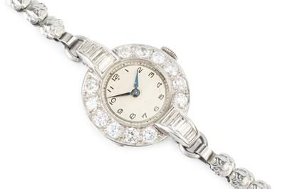 Lot 423 - A diamond cocktail watch, the circular bezel...