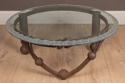 Lot 152 - A wrought iron and frosted glass-topped crafts-made table