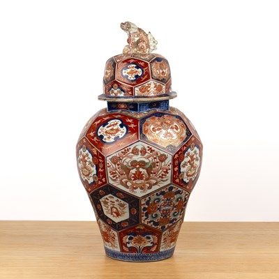 Lot 102 - Large Imari porcelain faceted vase and cover...