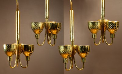 Lot 292 - A set of four Kalmar three-branch brass chandeliers