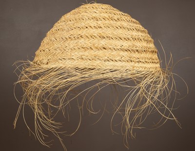 Lot 1062 - A Moroccan straw beehive woven lampshade