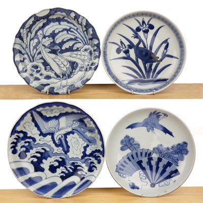 Lot 29 - Four blue and white porcelain chargers...