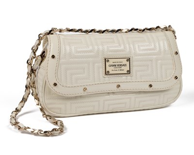 Lot 546 - A Gianni Versace cream, patent leather...