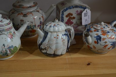 Lot 75 - Group of four porcelain teapots and a tea...
