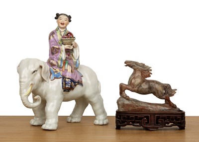 Lot 77 - Porcelain model of an elephant and a girl...