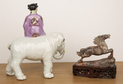 Lot 77 - Porcelain model of an elephant and a girl...