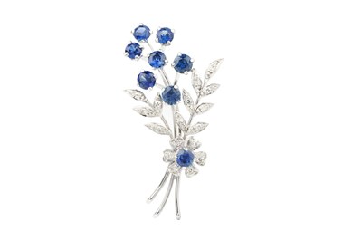 Lot 244 - A sapphire and diamond floral spray brooch,...