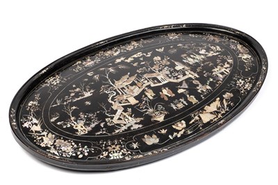 Lot 230 - A black lacquered oval tray with mother of pearl inlay