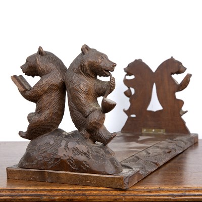 Lot 22 - Black Forest carved bookends with carved...
