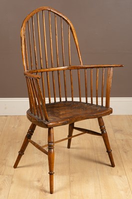 Lot 448 - An antique rustic Windsor chair