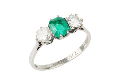 Lot 273 - An emerald and diamond three stone ring, the...