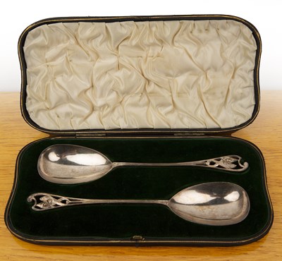 Lot 471 - Arts and Crafts cased pair of silver spoons...