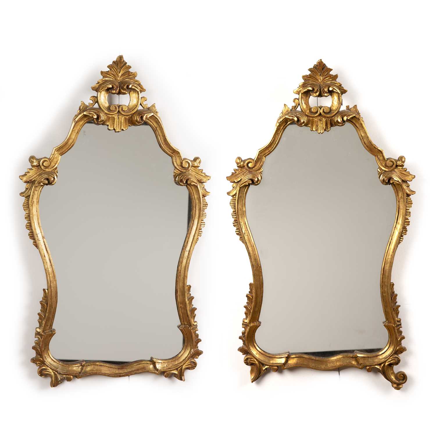 Lot 49 - Pair of gilt scroll mirrors 
with foliate...