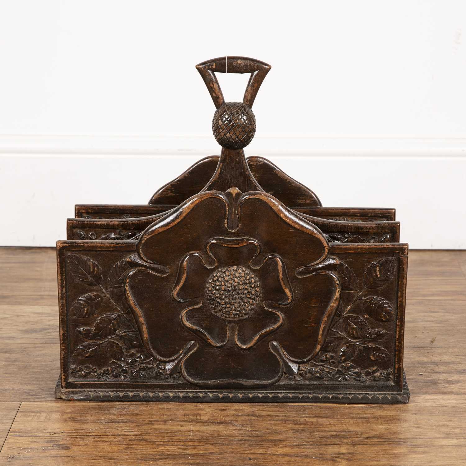 Lot 38 - Thistle carved magazine rack 38cm wide x 38cm...