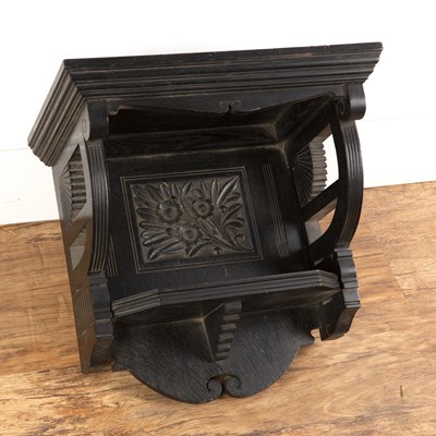 Lot 24 - Aesthetic ebonised wall bracket with carved...