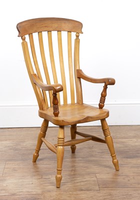 Lot 23 - Ash lathe back child's elbow chair stamped PW...