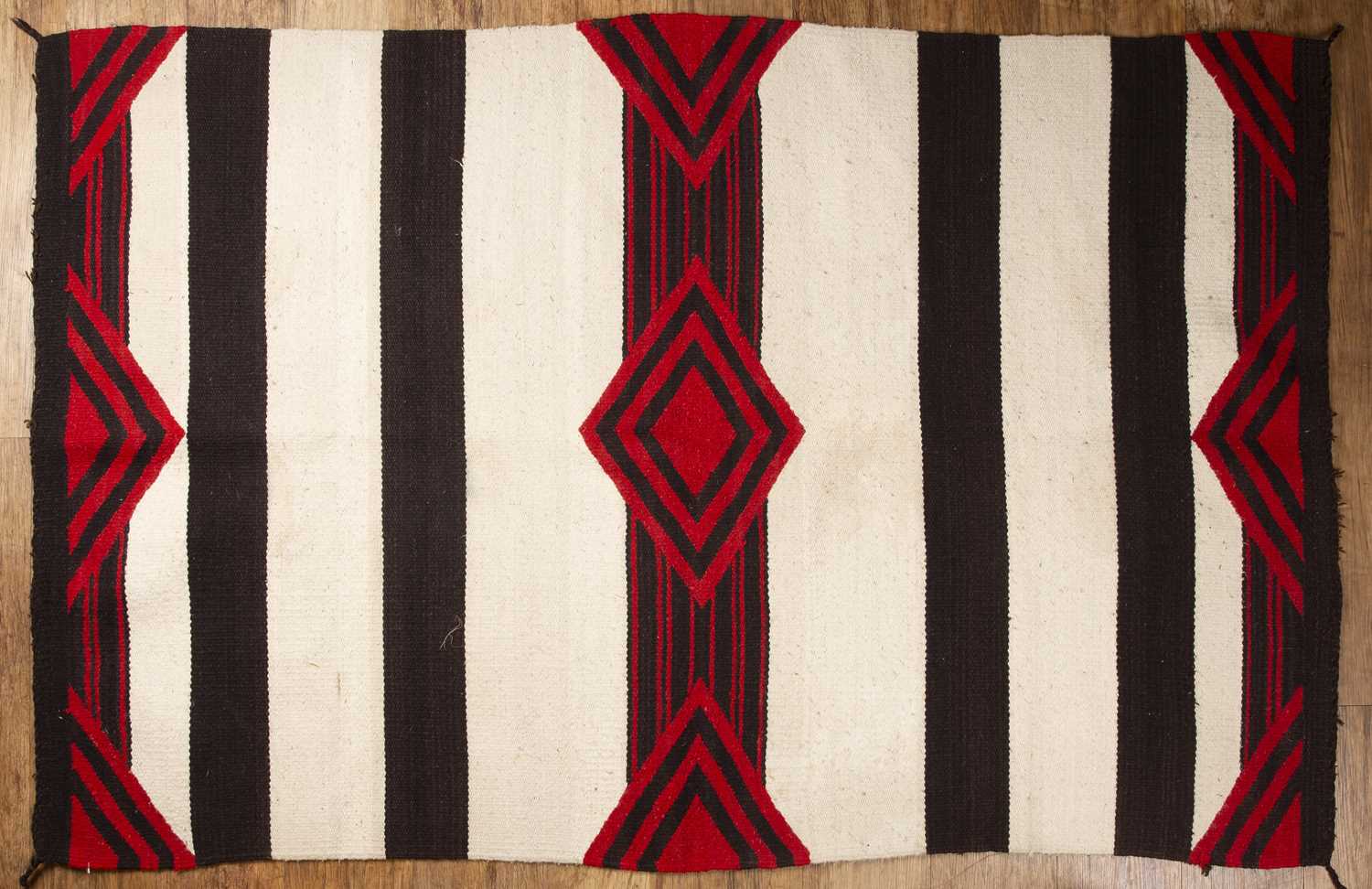 Lot 52 - Black and white striped chieftain's Navaho rug...