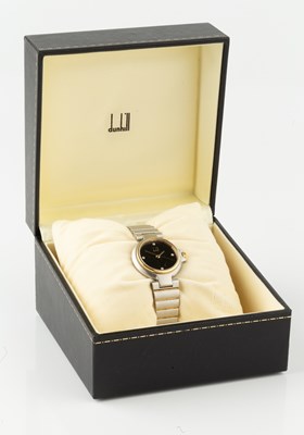 Lot 102 - A stainless steel bracelet watch by Dunhill,...