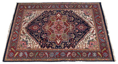 Lot 232 - A 20th century hand-woven Heriz style rug