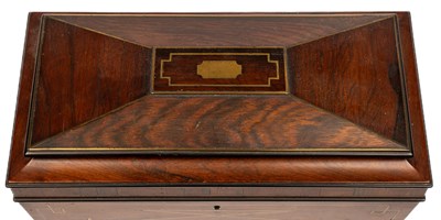 Lot 4 - A rosewood tea caddy with brass inlaid banding