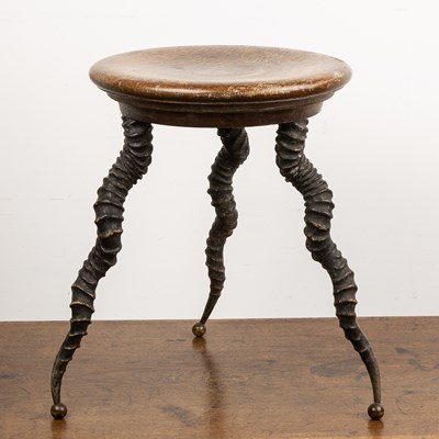 Lot 78 - Hardwood stool with antelope horn supports the...