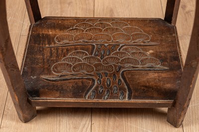 Lot 132 - A small Liberty & Co. carved table