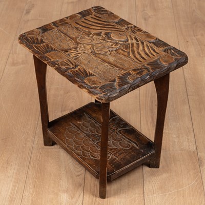 Lot 132 - A small Liberty & Co. carved table