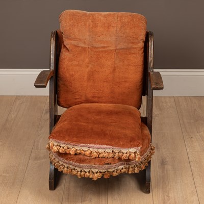 Lot 117 - A Liberty & Co. upholstered low chair by William Birch & co.