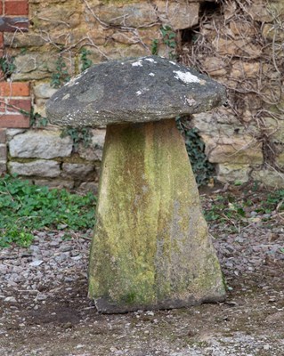 Lot 1240 - An old, weathered staddle stone