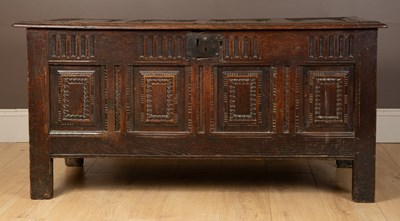 Lot 1103 - An 18th century oak chest