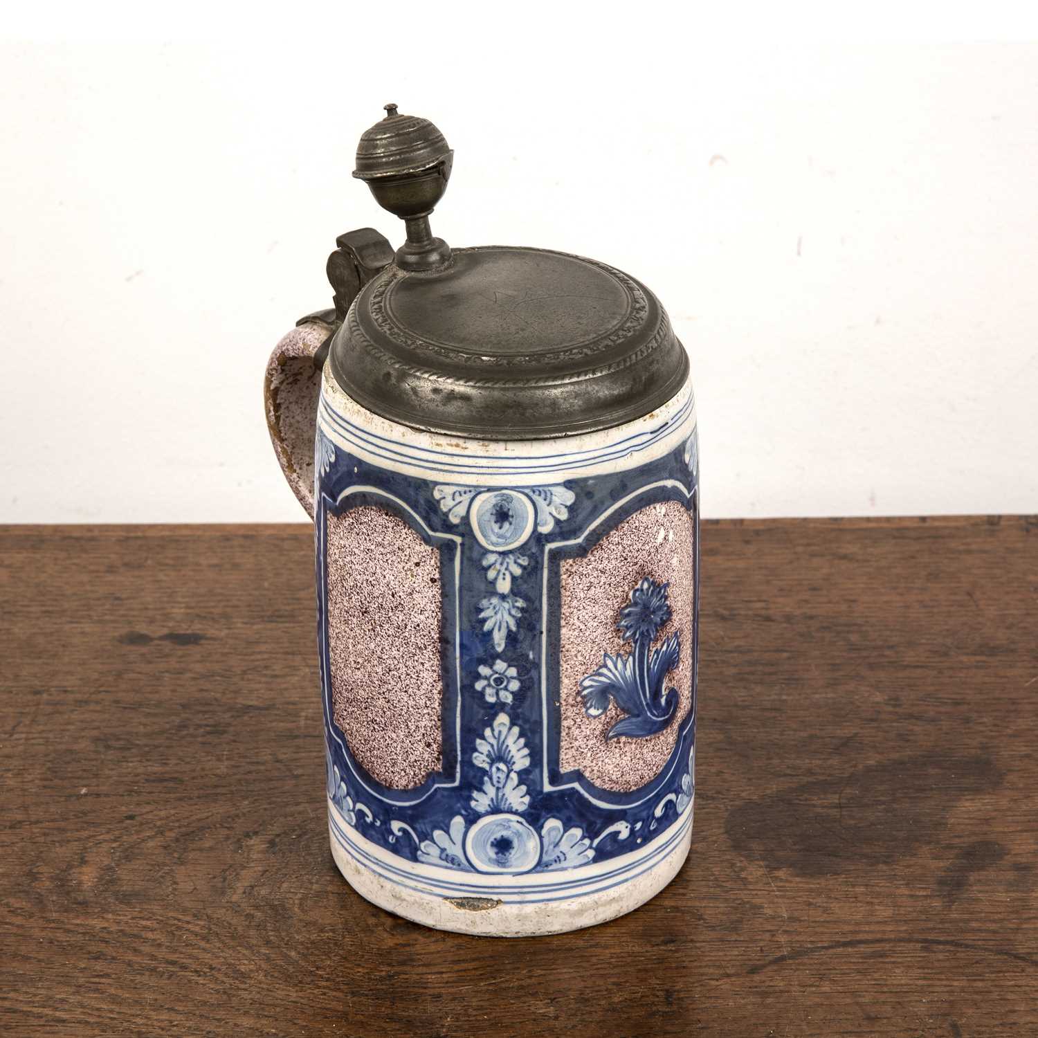 Lot 254 - Faience tankard with a pewter cover German,