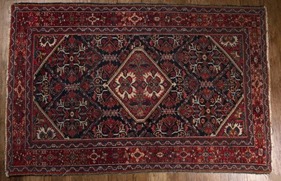 Lot 82 - Hamadan rug navy ground, decorated with a...