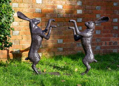 Lot 1309 - Two garden sculptures of bronze hares